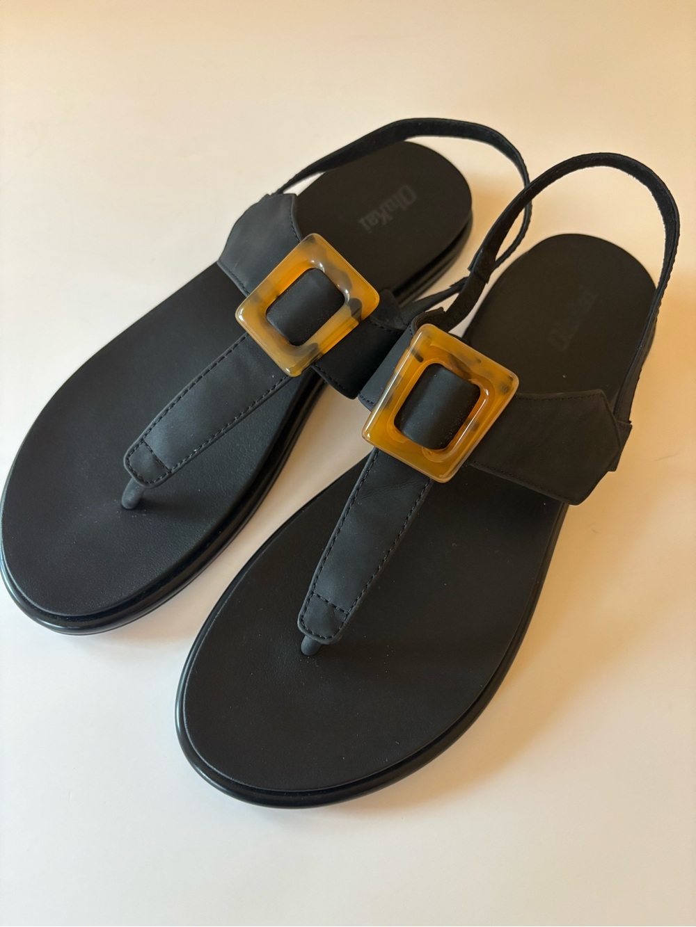 OluKai Black Slingback Sandals with Tortoiseshell Amber Buckles